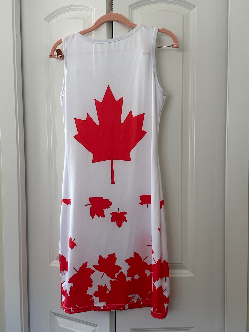 Sleeveless White Dress with Red Maple Leaf Print